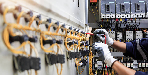 Professional Electrician technician working in Wild Peach Village, TX